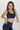 Move bra blue in model front side view - JUV