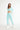 Rainbow legging mint green front view in model - JUV