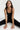 Sleek long jumpsuit black in model front view - JUV