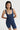 Sleek short jumpsuit dark blue in model front view close up - JUV