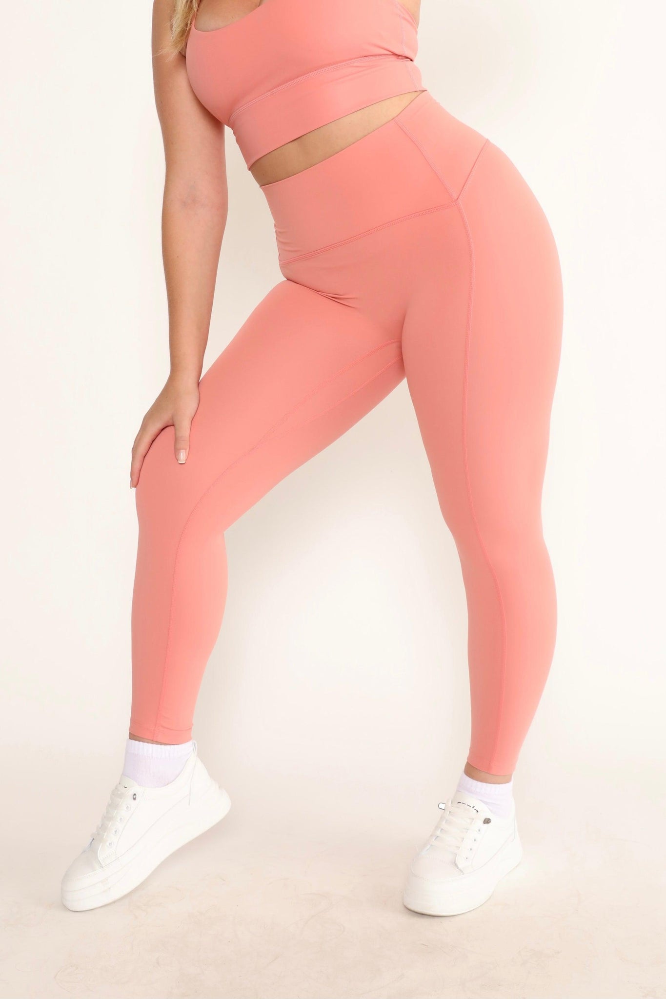 JUV unicorn legging in pink color, close up front/side view.