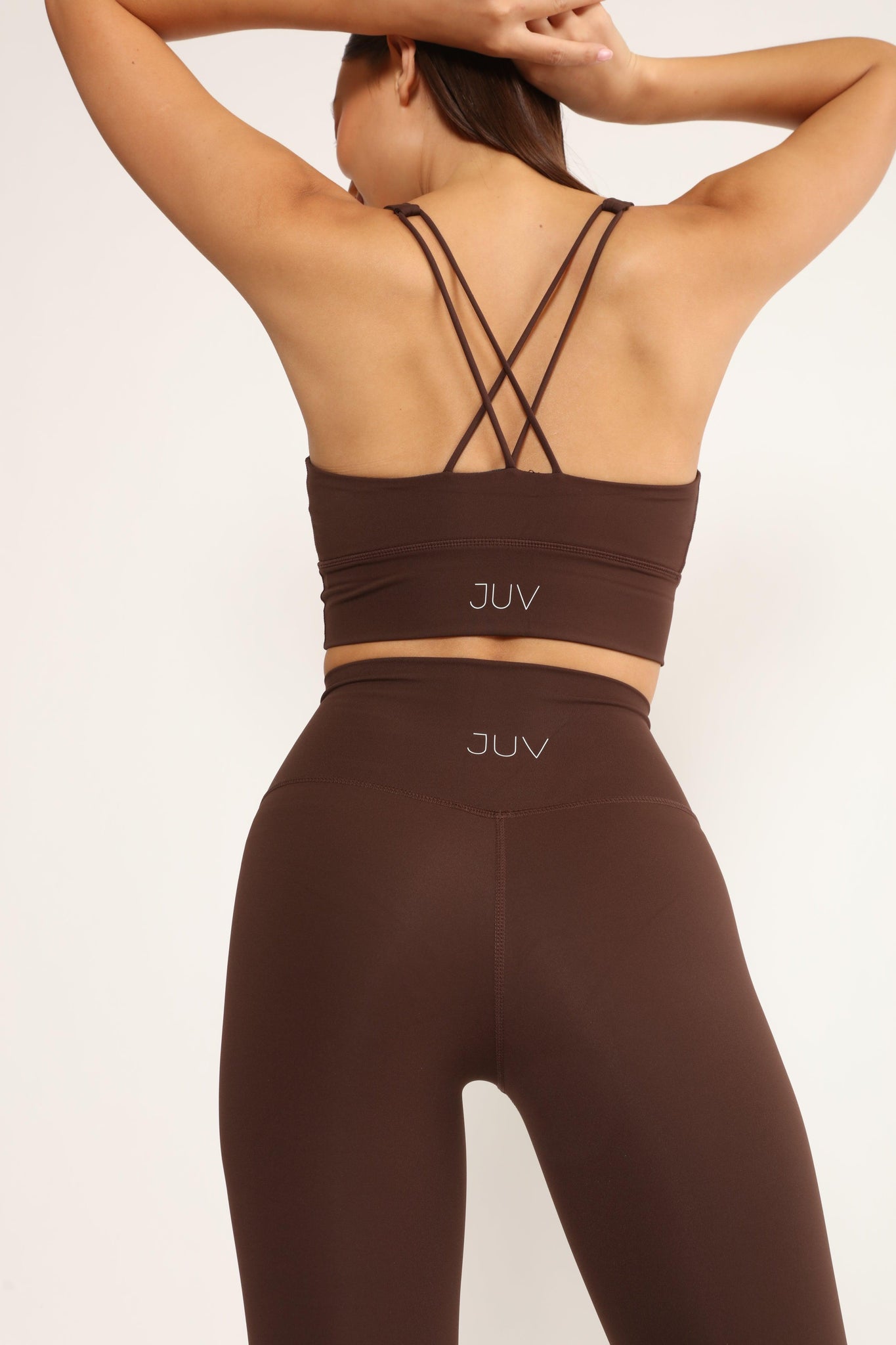 JUV unicorn legging in brown color, close up back view.