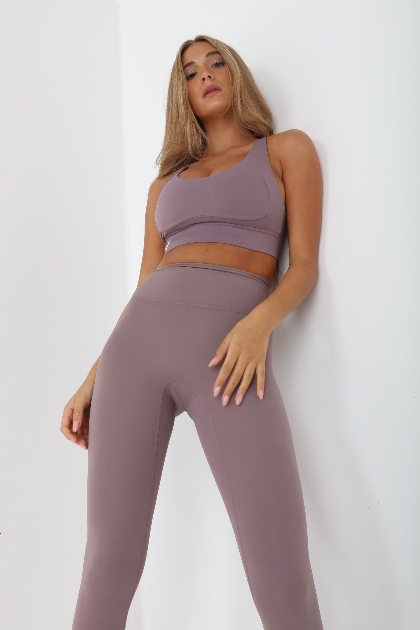JUV fresh legging in purple color with matching top, front view.