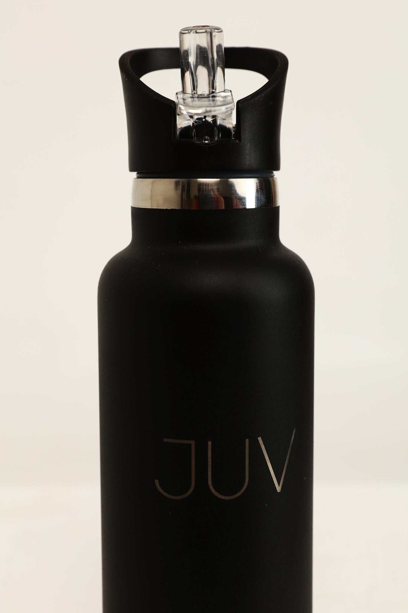 JUV pure thermal bottle with sipper in black, close up front view.