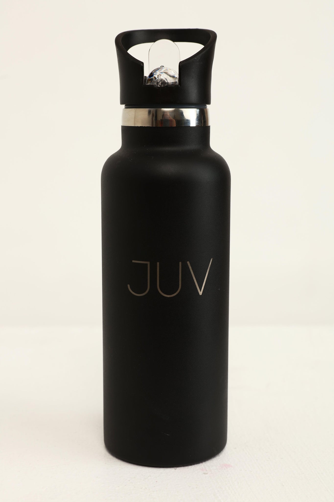 JUV pure thermal bottle with sipper in black, front view.