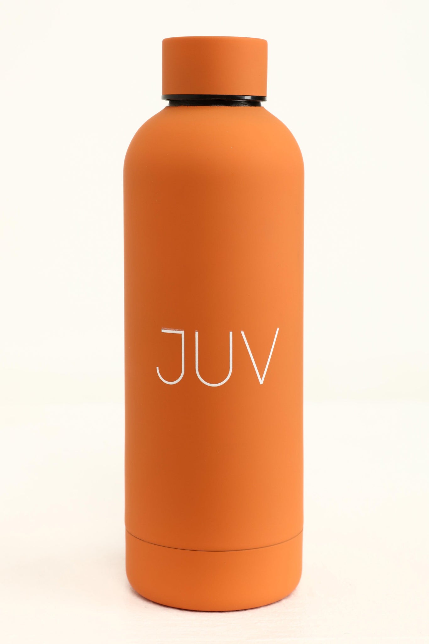 JUV mia thermal bottle in orange, front view.